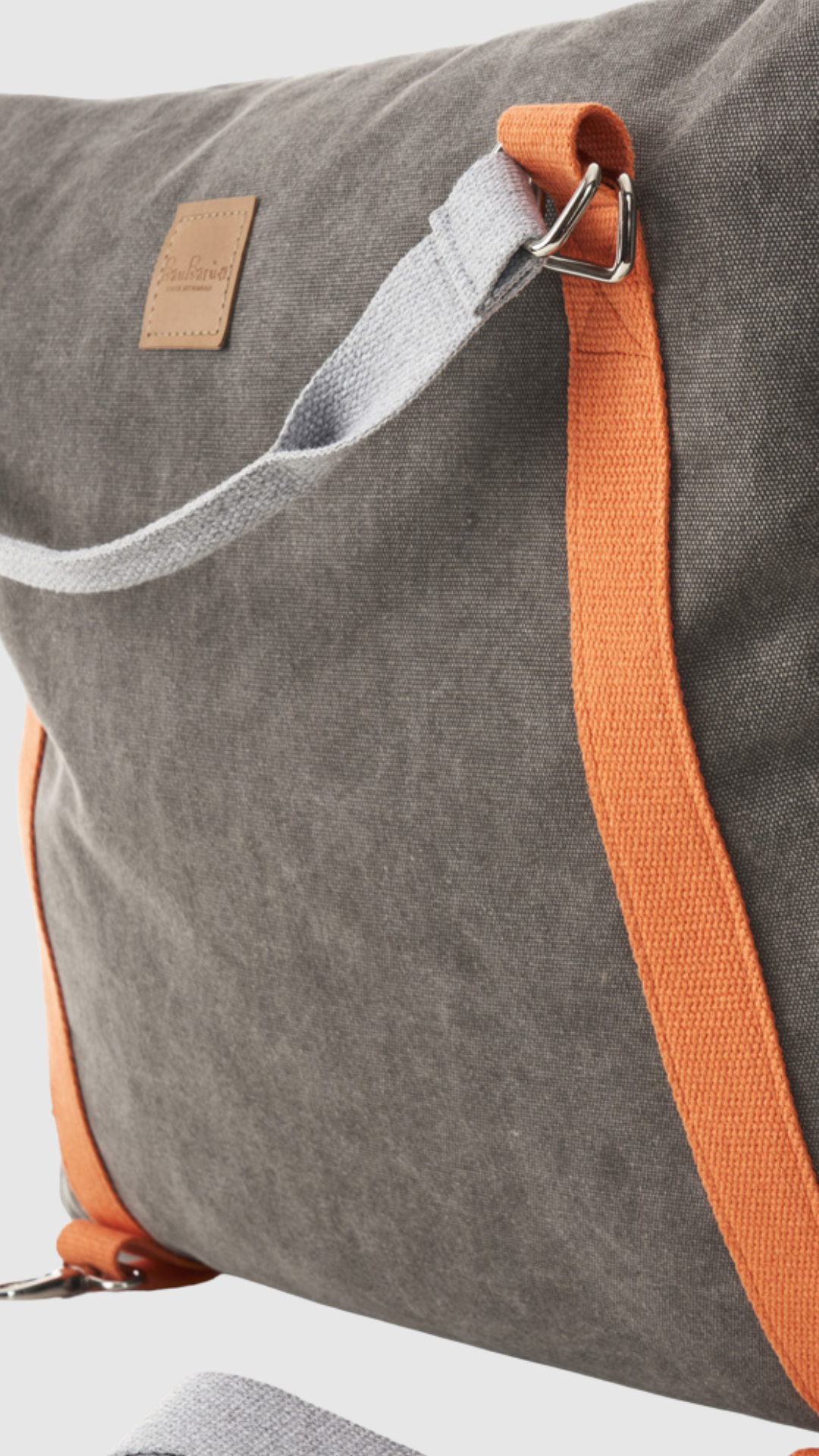 Detail van de geïntegreerde veiligheidslijn in de Bau Barù Autostoel Denim Grey